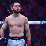 IsIslam Makhachev (red gloves) reacts after defeating Renato Moicano (blue gloves) in a lightweight title fight during UFC 311 at Intuit Dome.Islam Makhachev (red gloves) reacts after defeating Renato Moicano (blue gloves) in a lightweight title fight during UFC 311 at Intuit Dome.