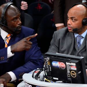 Feb 16, 2013; Houston, TX, USA; TNT broadcaster Shaquille O'Neal (left) and Charles Barkley talk during the 2013 NBA All-Star slam dunk contest at the Toyota Center. Mandatory Credit: Bob Donnan-Imagn Images