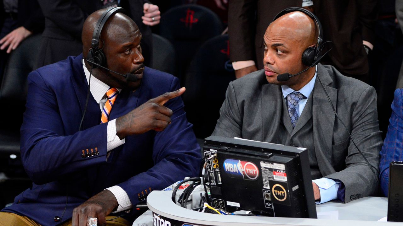 Feb 16, 2013; Houston, TX, USA; TNT broadcaster Shaquille O'Neal (left) and Charles Barkley talk during the 2013 NBA All-Star slam dunk contest at the Toyota Center. Mandatory Credit: Bob Donnan-Imagn Images