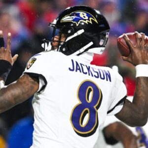 Jan 19, 2025; Orchard Park, New York, USA; Baltimore Ravens quarterback Lamar Jackson (8) throws the ball during the fourth quarter against the Buffalo Bills in a 2025 AFC divisional round game at Highmark Stadium.