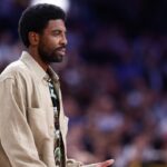 Kyrie Irving of Dallas Mavericks looks on during the basketball friendly match played between Real Madrid and Dallas Mavericks at Wizink Center pavilion on October 10, 2023, in Madrid, Spain.