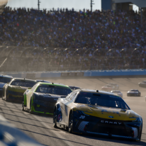 Nov 10, 2024; Avondale, Arizona, USA; NASCAR Cup Series driver Christopher Bell (20) leads the restart during the Cup Series championship race at Phoenix Raceway. Mandatory Credit: Gary A. Vasquez-Imagn Images
