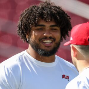 Dec 8, 2024; Tampa, Florida, USA; Tampa Bay Buccaneers offensive tackle Tristan Wirfs (78) and quarterback Baker Mayfield (6) warms up before a game against the Las Vegas Raiders at Raymond James Stadium.