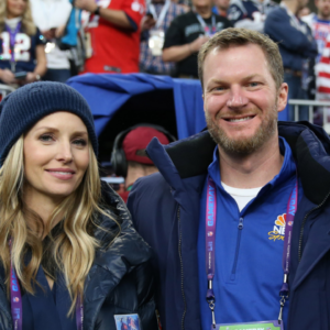 Feb 4, 2018; Minneapolis, MN, USA; NASCAR retired driver Dale Earnhardt, Jr. and wife Amy Reimann in attendance before Super Bowl LII between the Philadelphia Eagles and the New England Patriots at U.S. Bank Stadium. Mandatory Credit: Mark J. Rebilas-Imagn Images