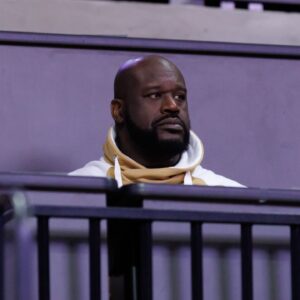 Former NBA player Shaquille O'Neal sits courtside during the first half between the Florida Gators and the LSU Tigers at Exactech Arena at the Stephen C. O'Connell Center