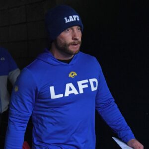 Los Angeles Rams head coach Sean McVay walks towards the field against the Philadelphia Eagles in a 2025 NFC divisional round game at Lincoln Financial Field.