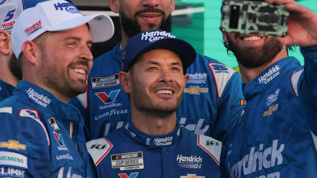 NASCAR Cup Series driver Kyle Larson (5) celebrates with teammates after winning the Straight Talk Wireless 400 at Homestead-Miami Speedway.