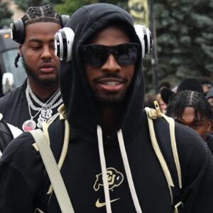 Sep 21, 2024; Boulder, Colorado, USA; Colorado Buffaloes quarterback Shedeur Sanders (2) walks through Buff Walk before the game against the Baylor Bears at Folsom Field.