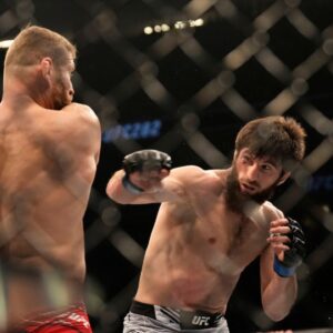 Jan Blachowicz battles Magomed Ankalaev in their Light Heavyweight fight during the UFC 282 event at T-Mobile Arena on December 10, 2022 in Las Vegas, Nevada, United States