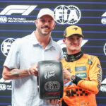 Qualifying In Melbourne, Australia, on March 15, 2025, Kyle Chalmers of Australia and Olympic Swimming Champion presents the Pirelli Pole Position award to Lando Norris of Great Britain and the McLaren F1 Team during Qualifying ahead of the F1 Grand Prix of Australia at Albert Park Circuit