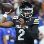 Dec 28, 2024; San Antonio, TX, USA; Colorado Buffaloes quarterback Shedeur Sanders (2) attempts a pass during the first quarter against the Brigham Young Cougars at Alamodome.