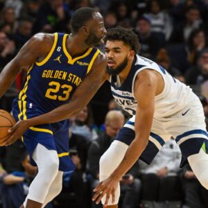 Draymond Green (L) and Kar-Anthony Towns