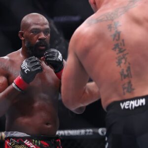 Jon Jones (red gloves) fights Stipe Miocoic (blue gloves) in the heavyweight bout during UFC 309 at Madison Square Garden.