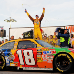 Mar. 1, 2009; Las Vegas, NV, USA; NASCAR Sprint Cup Series driver Kyle Busch celebrates after winning the Shelby 427 at Las Vegas Motor Speedway. Mandatory Credit: Mark J. Rebilas-Imagn Images