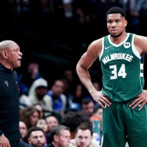 Milwaukee Bucks head coach Doc Rivers speaks to Milwaukee Bucks forward Giannis Antetokounmpo (34) during the second half against the Dallas Mavericks at American Airlines Center.