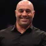 Joe Rogan looks on during UFC 193 at Etihad Stadium.