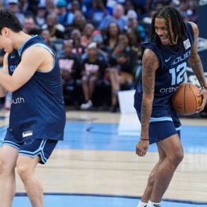 Grizzlies' Yuki Kawamura (17) and Ja Morant (12) do the griddy dance during open practice at FedExForum in Memphis, Tenn.