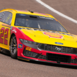 Mar 23, 2025; Homestead, Florida, USA; NASCAR Cup Series driver Joey Logano (22) races during the Straight Talk Wireless 400 at Homestead-Miami Speedway. Mandatory Credit: Sam Navarro-Imagn Images