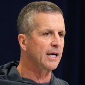 Baltimore Ravens coach John Harbaugh speaks during the NFL Scouting Combine at the Indiana Convention Center.