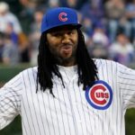 Sep 21, 2023; Chicago, Illinois, USA; 2019 Academy Award-winner Matthew Cherry for animated short film, Hair Love, throws out a ceremonial first pitch before the game between the Chicago Cubs and the Pittsburgh Pirates at Wrigley Field.
