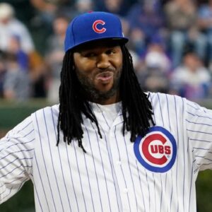 Sep 21, 2023; Chicago, Illinois, USA; 2019 Academy Award-winner Matthew Cherry for animated short film, Hair Love, throws out a ceremonial first pitch before the game between the Chicago Cubs and the Pittsburgh Pirates at Wrigley Field.