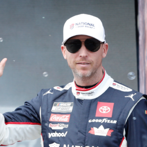 NASCAR Cup Series driver Denny Hamlin (11) walks out onto the stage for driver introductions before the EchoPark Automotive Grand Prix at Circuit of the Americas.