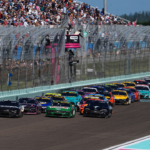 NASCAR Cup Series driver Kyle Busch (8) and NASCAR Cup Series driver Joey Logano (22) lead the field to restart the Straight Talk Wireless 400 at Homestead-Miami Speedway.