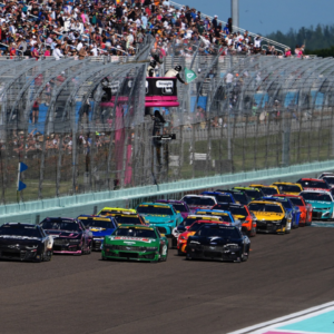 NASCAR Cup Series driver Kyle Busch (8) and NASCAR Cup Series driver Joey Logano (22) lead the field to restart the Straight Talk Wireless 400 at Homestead-Miami Speedway.