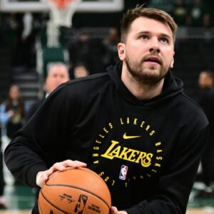 Los Angeles Lakers guard Luka Doncic (77) warms up before a game against the Milwaukee Bucks at Fiserv Forum