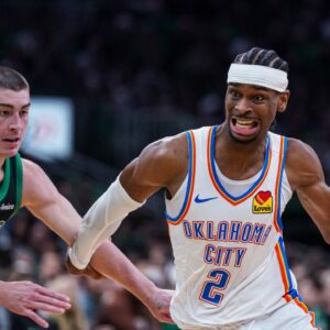 Oklahoma City Thunder guard Shai Gilgeous-Alexander (2) drives the ball against Boston Celtics guard Payton Pritchard (11) in the third quarter at TD Garden.