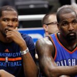 Oklahoma City Thunder forward Kevin Durant (35) and center Kendrick Perkins (5) look on from the bench against the Orlando Magic during the second half at Amway Center. Oklahoma City Thunder defeated the Orlando Magic 127-99