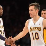 Los Angeles Lakers shooting guard Kobe Bryant (24) slaps hands with teammate Steve Nash during a game against the Oklahoma City Thunder during the second half at Staples Center.