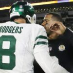 Oct 20, 2024; Pittsburgh, Pennsylvania, USA; New York Jets quarterback Aaron Rodgers (8) and Pittsburgh Steelers quarterback Russell Wilson (right) greet each other after their game at Acrisure Stadium.