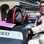 NASCAR Xfinity Series driver Sheldon Creed (18) climbs into his car Saturday, July 20, 2024, during qualifying for the Pennzoil 250 at Indianapolis Motor Speedway.