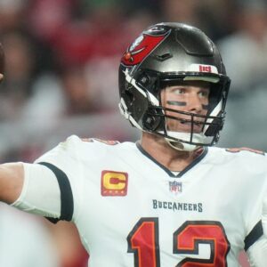 Tampa Bay Buccaneers quarterback Tom Brady (12) throws the ball against the Arizona Cardinals at State Farm Stadium in Glendale on Dec. 25, 2022.
