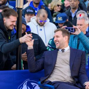 Dallas Mavericks guard Luka Doncic and former player Dirk Nowitzki and Mavericks owner Mark Cuban during the ceremony for the unveiling of a statue of Nowitzki before the game between the Dallas Mavericks and the Los Angeles Lakers American Airlines Center