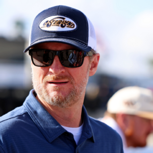 NASCAR team owner Dale Earnhardt Jr. looks on during practice for the Daytona 500 at Daytona International Speedway.