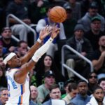 Oklahoma City Thunder guard Shai Gilgeous-Alexander (2) shoots the ball against the Boston Celtics in the fourth quarter at TD Garden