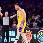 Los Angeles Lakers guard Luka Doncic (77) reacts after scoring a basket against the New York Knicks during overtime at Crypto.com Arena