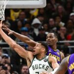 Milwaukee Bucks forward Giannis Antetokounmpo (34) takes a shot against Los Angeles Lakers center Christian Koloko (10) in the third quarter at Fiserv Forum