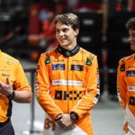Zak Brown, Team Principal of McLaren F1 Team, Oscar Piastri of McLaren F1 Team MCL38, and Lando Norris of McLaren F1 Team MCL38 pose for a portrait during the Formula 1 Singapore Grand Prix 2024 on the Marina Bay Circuit in Singapore