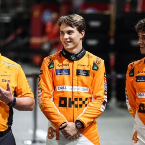 Zak Brown, Team Principal of McLaren F1 Team, Oscar Piastri of McLaren F1 Team MCL38, and Lando Norris of McLaren F1 Team MCL38 pose for a portrait during the Formula 1 Singapore Grand Prix 2024 on the Marina Bay Circuit in Singapore