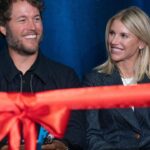 Mathew and Kelly Stafford share a laugh during speeches for the ribbon cutting of the Kelly and Matthew Stafford and Friends Education Center at the S.A.Y Detroit Play Center in Detroit on Monday, April 1, 2024.