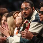 Former NBA forward Carmelo Anthony and his son Kyian Anthony during game two of the 2024 WNBA Semi-finals at Barclays Center