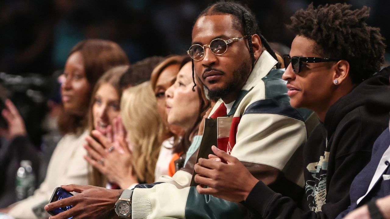 Former NBA forward Carmelo Anthony and his son Kyian Anthony during game two of the 2024 WNBA Semi-finals at Barclays Center