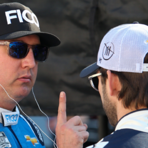 NASCAR Cup Series driver Kyle Busch (8) talks with driver Daniel Suarez (99) before practice for the Food City 500 at Bristol Motor Speedway.