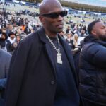Retired American football player Chad Johnson on the sidelines before the game between the Utah Utes against the Colorado Buffaloes at Folsom Field.