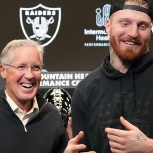 Las Vegas Raiders defensive end Maxx Crosby (right) and coach Pete Carroll at press conference at Intermountain Health Performance Center.