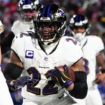 Jan 19, 2025; Orchard Park, New York, USA; Baltimore Ravens running back Derrick Henry (22) runs the ball during the third quarter against the Buffalo Bills in a 2025 AFC divisional round game at Highmark Stadium.