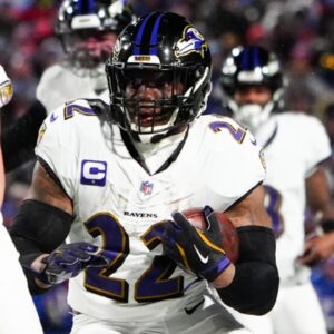 Jan 19, 2025; Orchard Park, New York, USA; Baltimore Ravens running back Derrick Henry (22) runs the ball during the third quarter against the Buffalo Bills in a 2025 AFC divisional round game at Highmark Stadium.